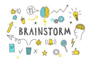 A picture with a lot ideas floating around the word brainstorm.