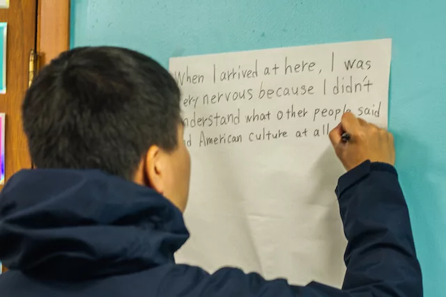 Male student writing about first US experience.