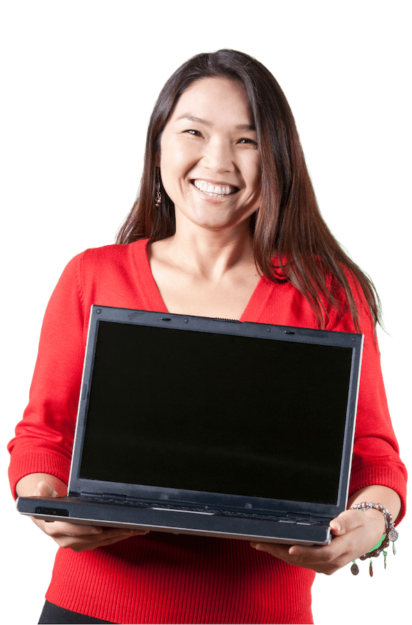 A woman smiling while holding a laptop computer.