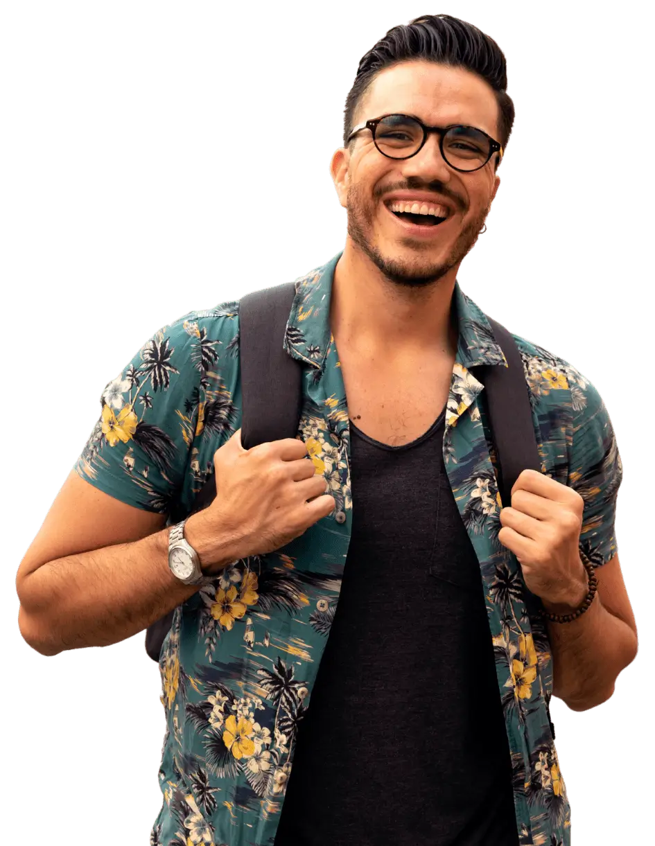 Young man wearing glasses and caring a backpack smiling