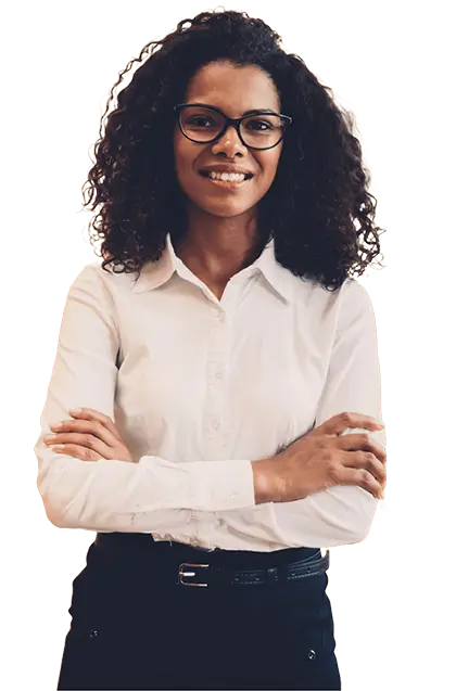 A black woman in a white shirt with her arms crossed looking confident and smiling.