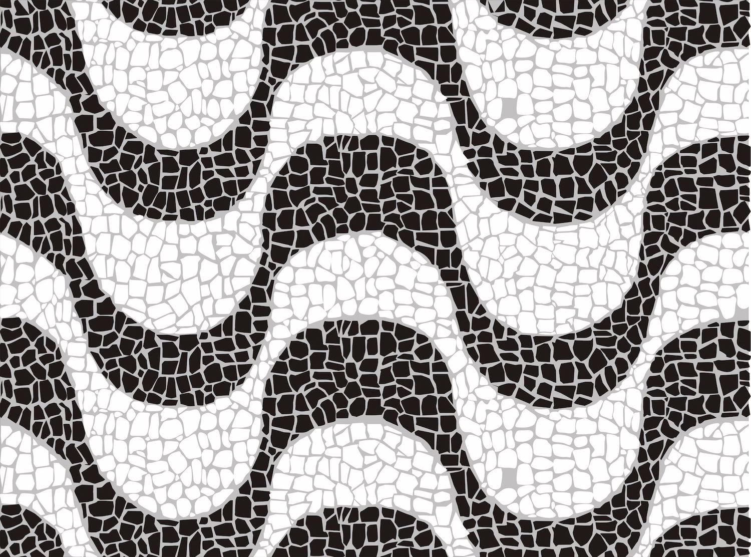 A wavy tile design in contrasting black and white made up of small pieces of mosaic tiles