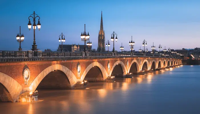 Pont de Perre over River Gardonne, Bordeaux, France, with Cathedral in background.