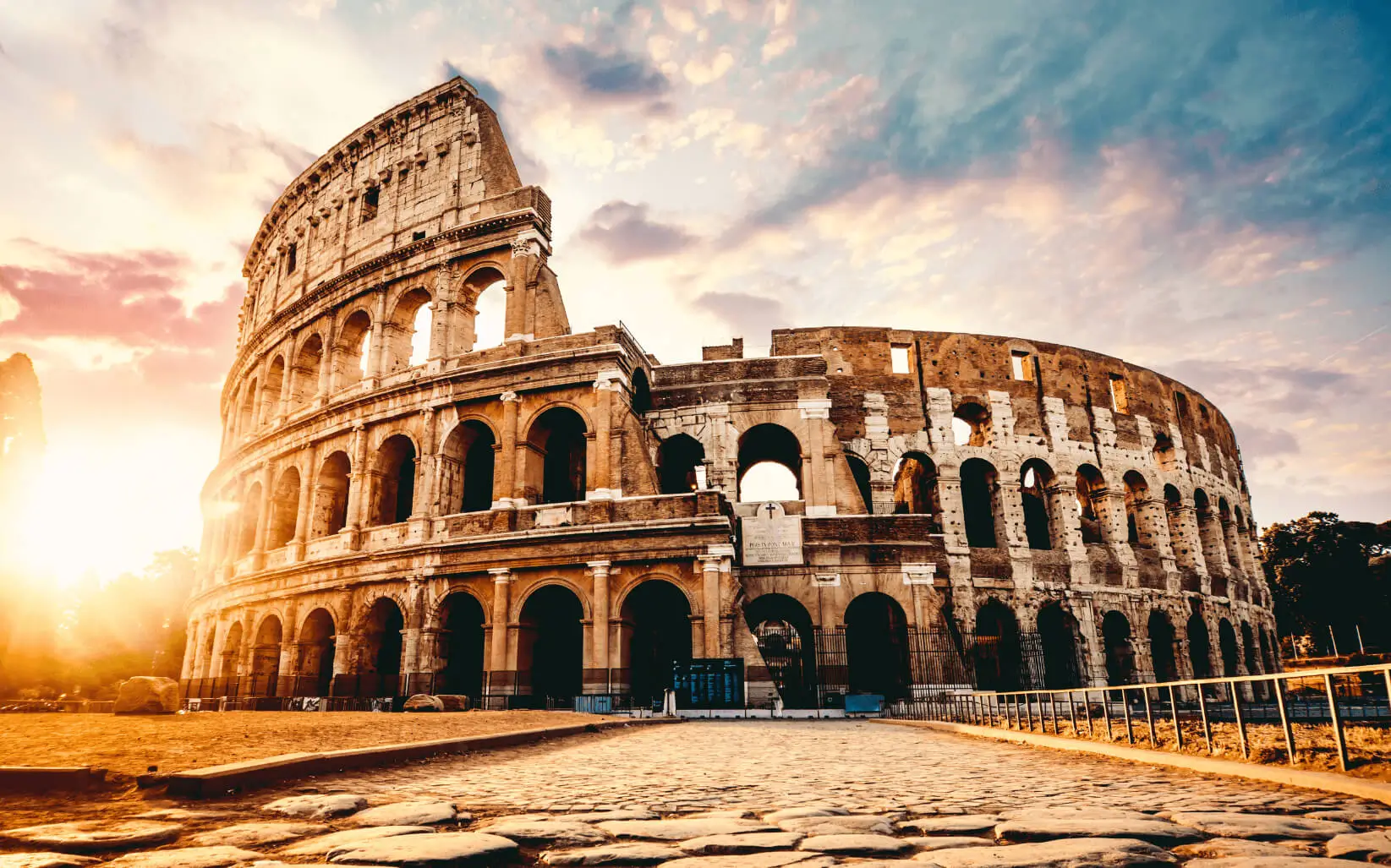 The Colosseum in Rome, Italy at sunset.