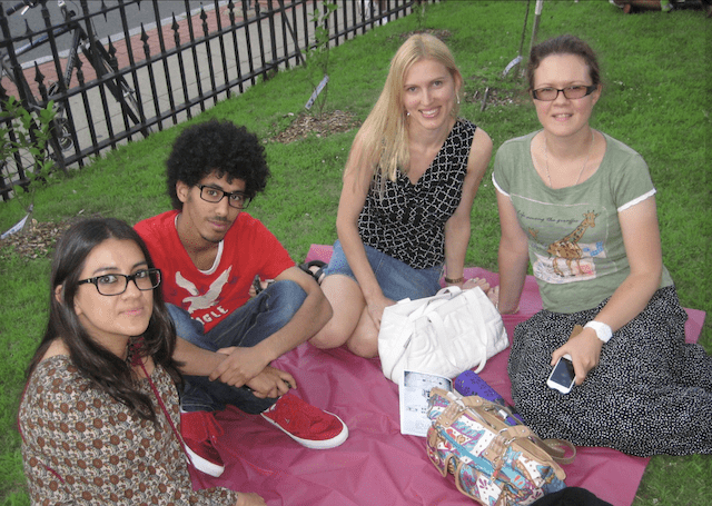 German teacher, Linda Sileniece, with 3 students at a free outdoor concert in Northampton,MA.