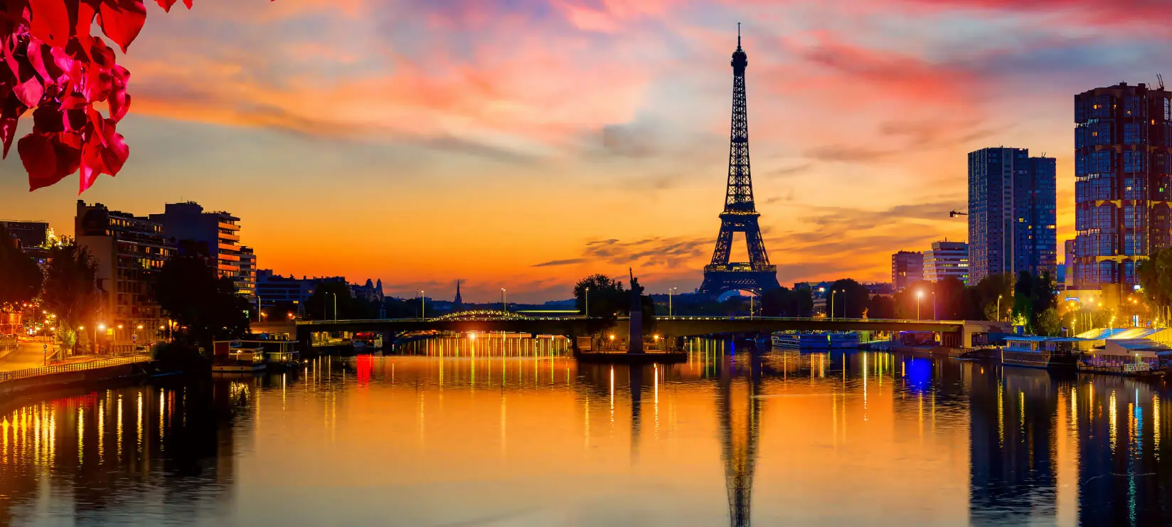 A view of the Eiffel tower at sunset.