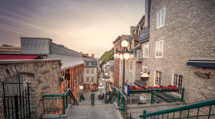 A view looking down the long stairs down to the stone buildings of Old Québec.
