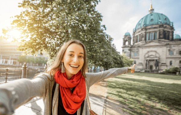 woman taking a selfie in front of Berlin Cathedral