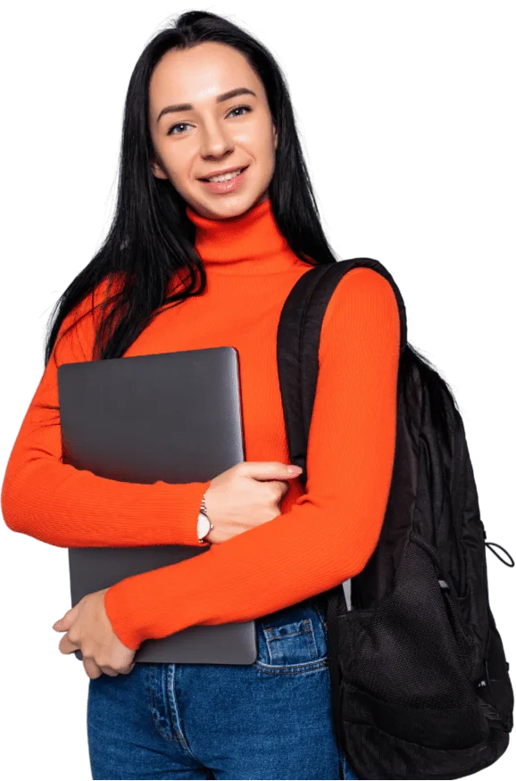 A woman wearing an orange shirt and a black backpack is holding a laptop in her hands.