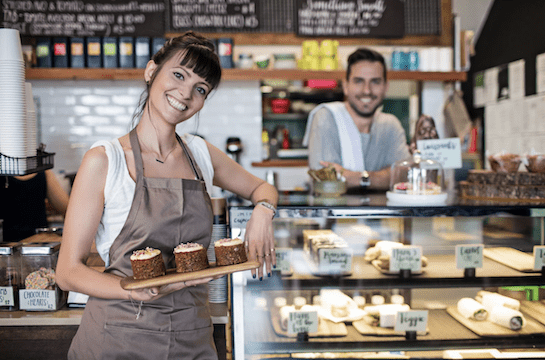 Two workers in a French cafe.