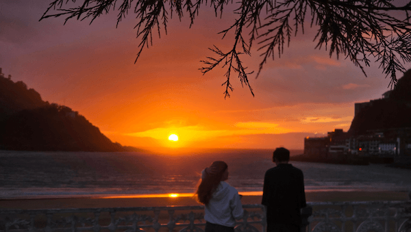 two people watching the sunset.