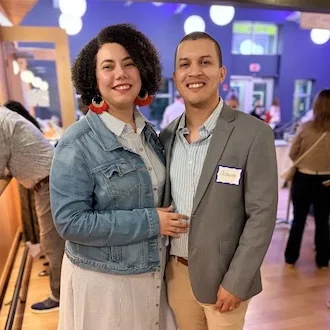 A couple smiling