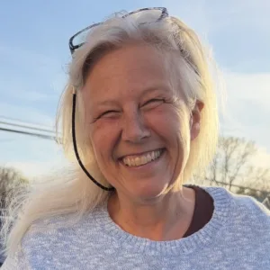 A woman smiling.