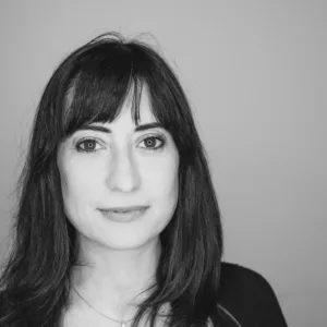 A head shot of a woman with dark hair