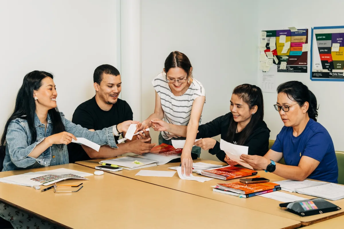 ILI English instructor Elizabeth leading a classroom activity with students.